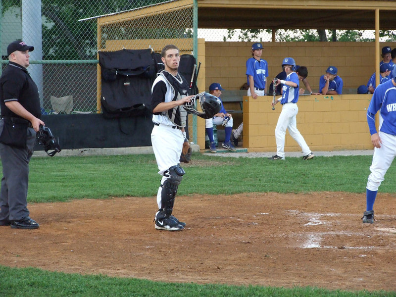 Image: Brandon Souder checks Coach Ward for instructions.