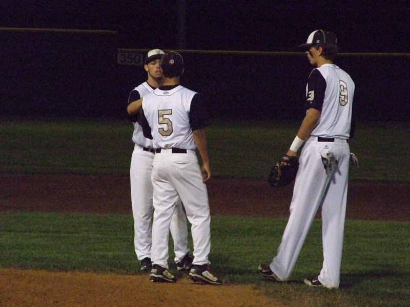 Image: Infield chats on the mound.