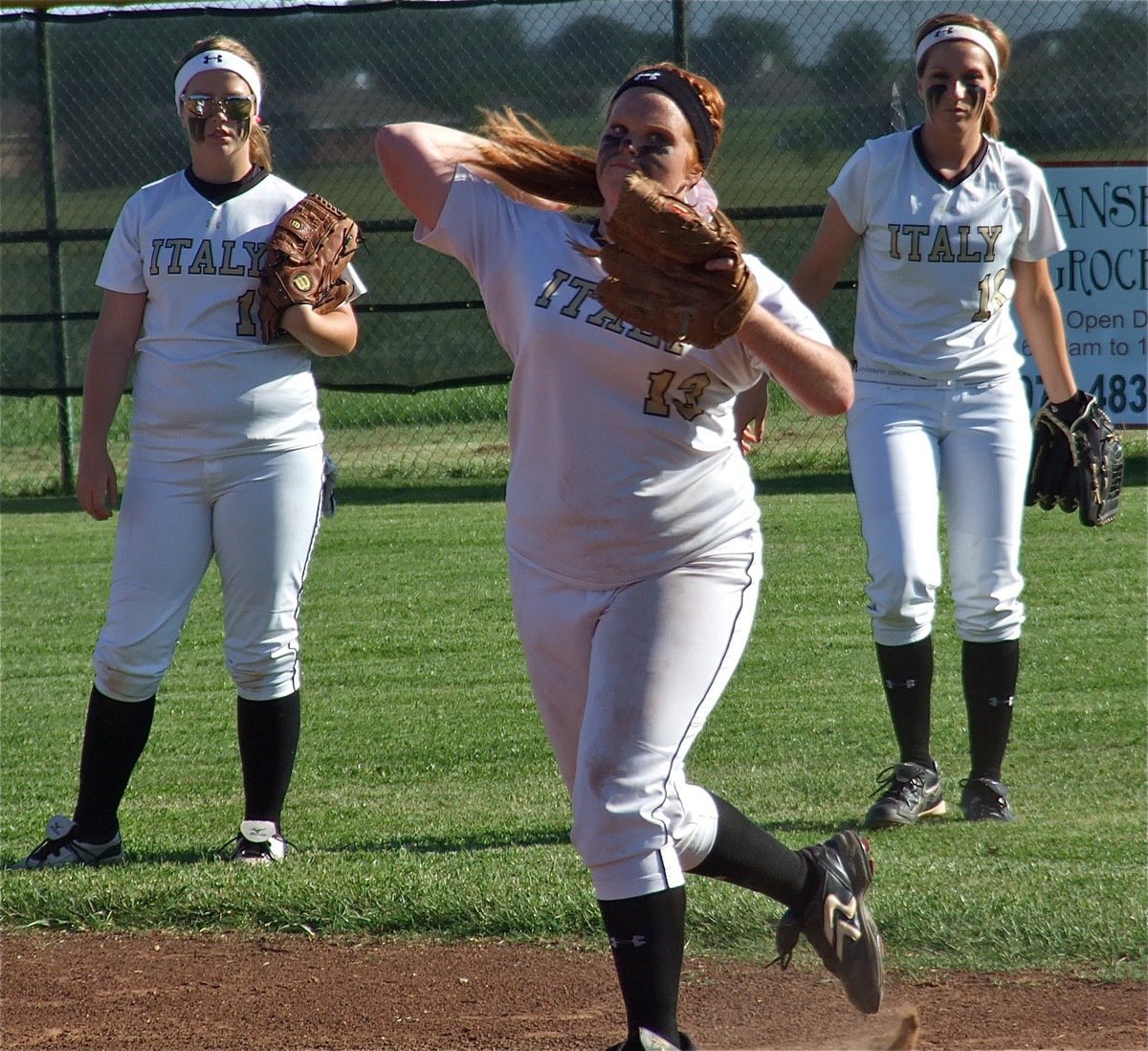 Image: Katie Byers(13), gets ready for Whitney along with Paige Westbrook(10) and Bailey Bumpus(18).