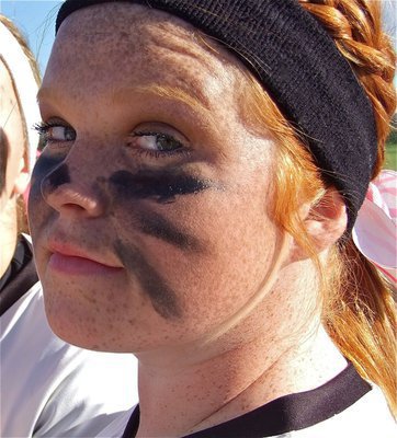 Image: Lady Gladiator, Katie Byers gets painted up for the Lady Wildcats.
