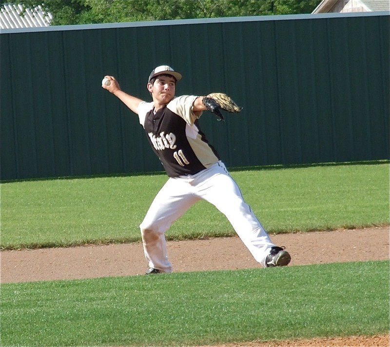 Image: JV Gladiator, Tyler Anderson tries to make a play from his shortstop position.