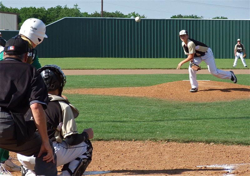 Image: Bailey Walton takes the mound for the JV Gladiators.