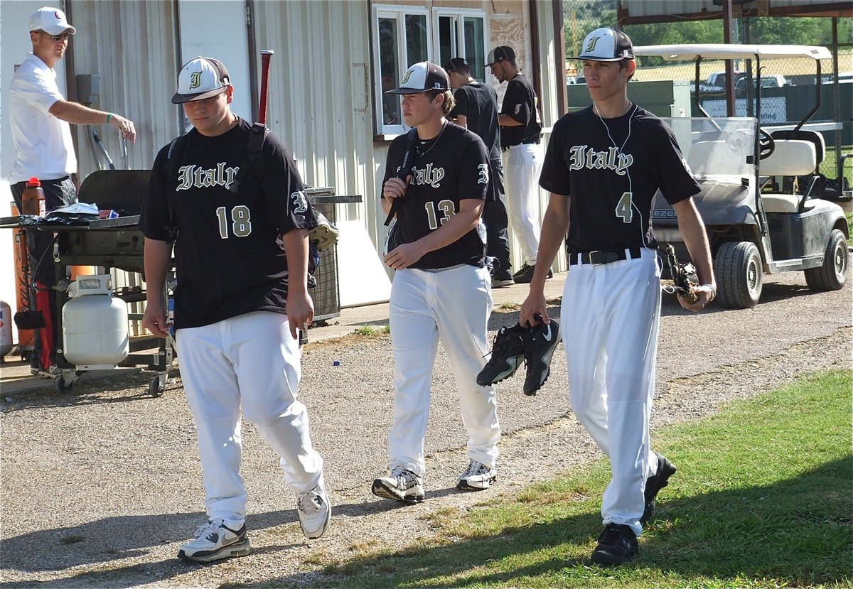 Image: Gladiators, John Byers(18), Jusin Buchanan(13) and Alex DeMoss(4) head into battle against the Cubs.