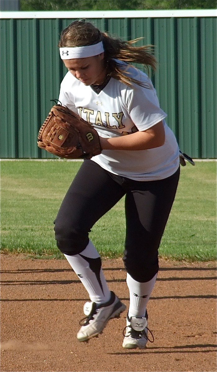 Image: Lady Gladiator, Paige Westbrook(10) collects a grounder.