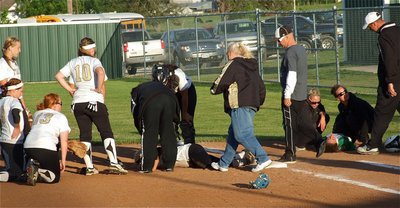 Image: War zone: A collision between Clifton’s base runner and senior Lady Gladiator, Megan Richards, left both players agonizing in pain while coaches treated the wounded.