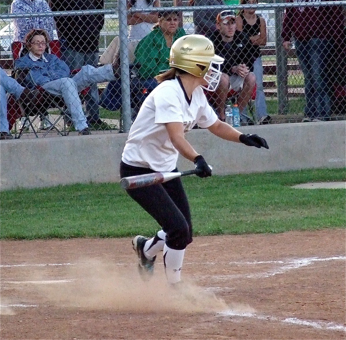 Image: Italy freshman, Bailey Eubank(11) slaps a double over Clifton’s third baseman.