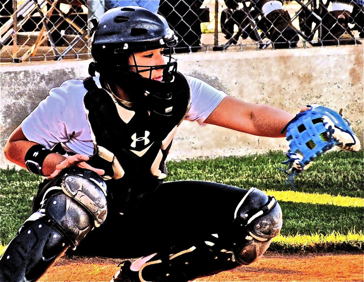 Image: Lady Gladiator catcher, Alyssa Richards wraps her glove around a strike.