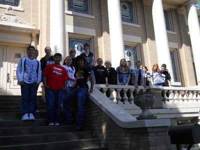 Image: IHS students on a field trip to view their work.