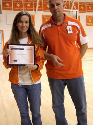 Image: Carol Grimes received a Gold Star Performance Award for teaching math.