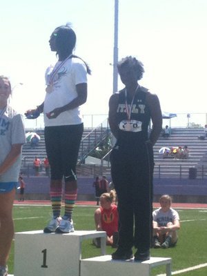 Image: On the podium as the second place finisher in the long jump at the regional meet in Stephenville, Texas.