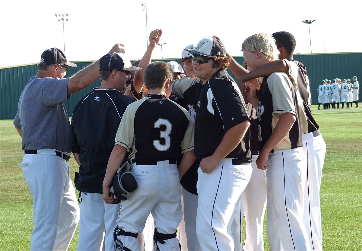 Image: The loss to Rio Vista fails to dampen the spirits of Italy’s JV squad who share one last team huddle.