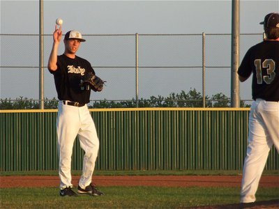 Image: Third baseman, Brandon Souder(17) gives the ball to pitcher, Justin Buchanan(13).