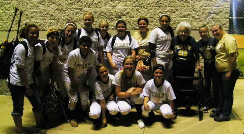 Image: Lady Gladiators pose with their #1 fan, Mrs. Riddle!!!