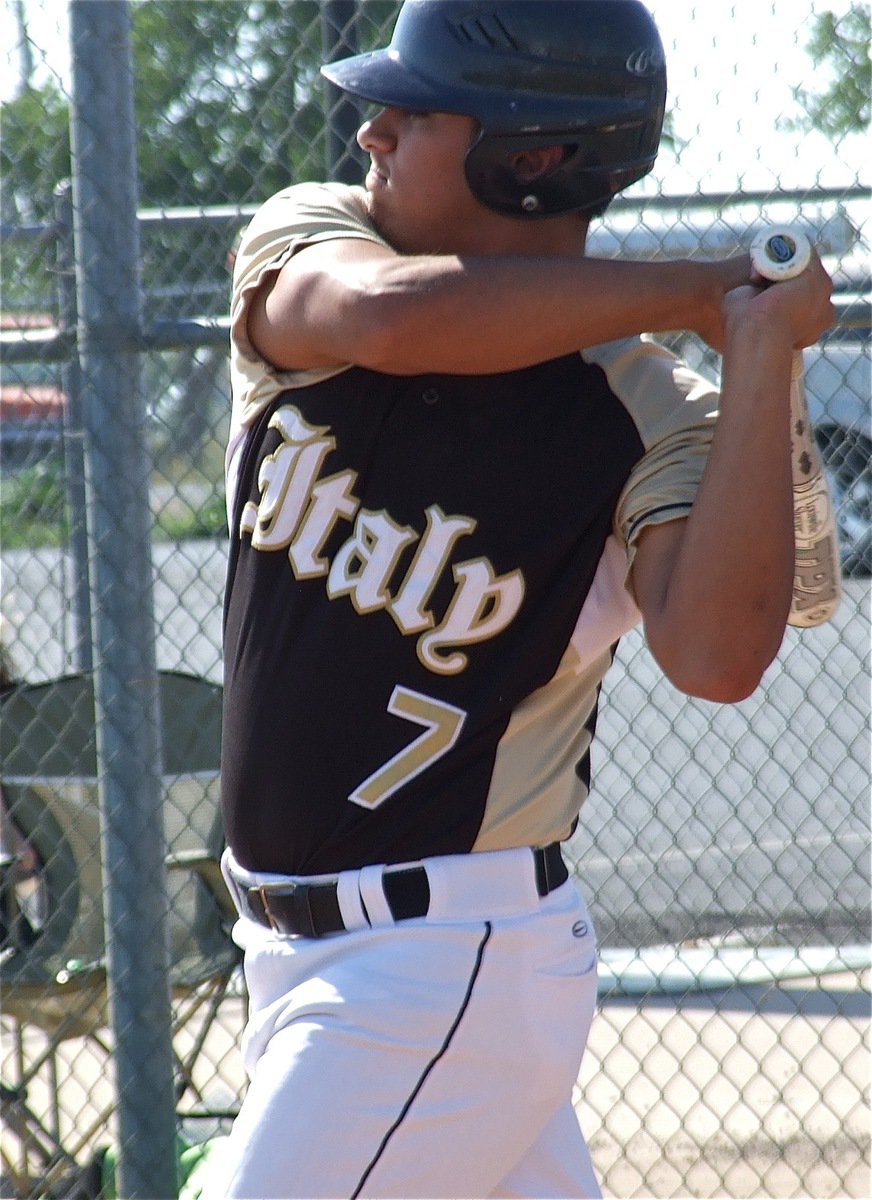 Image: Omar Estrada(7) takes one of his final swings as a member of Italy Baseball.