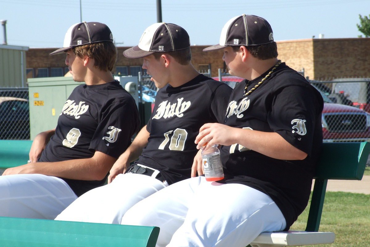 Image: Cole Hopkins(9), Chase Hamilton(10) and John Byers(18) take in the action.