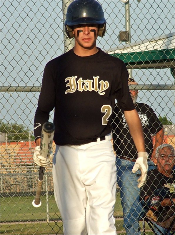 Image: Italy’s Caden Jacinto(2) approaches the plate with a look of intimidation.