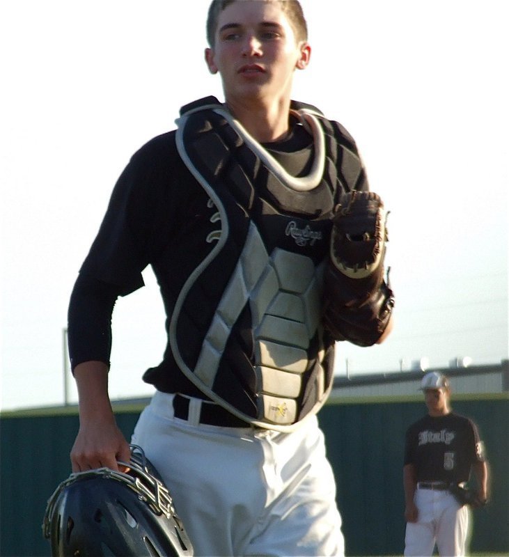 Image: Ross Stiles(1) returns to the plate after the conference at the mound.