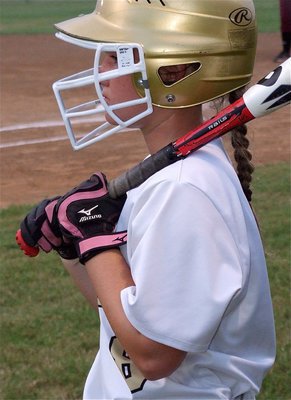 Image: Lady Gladiator freshman, Tara Wallis(8) is ready for her turn at the plate.