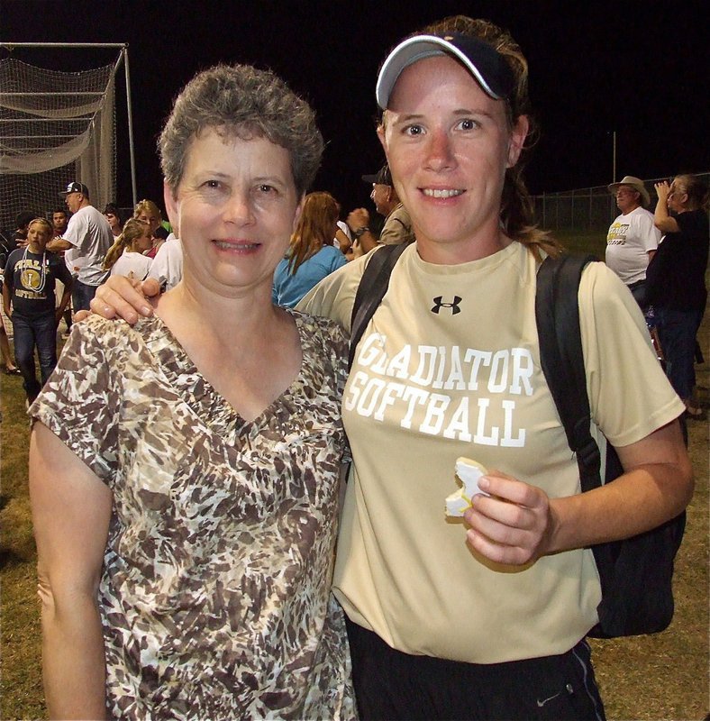 Image: Lady Gladiator head coach, Jennifer Reeves, is joined by her mother, MaryLou Reeves, after Italy’s game 1 win over Mildred, 3-1.