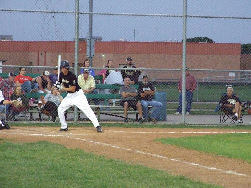 Image: Alex DeMoss gets up to bat.