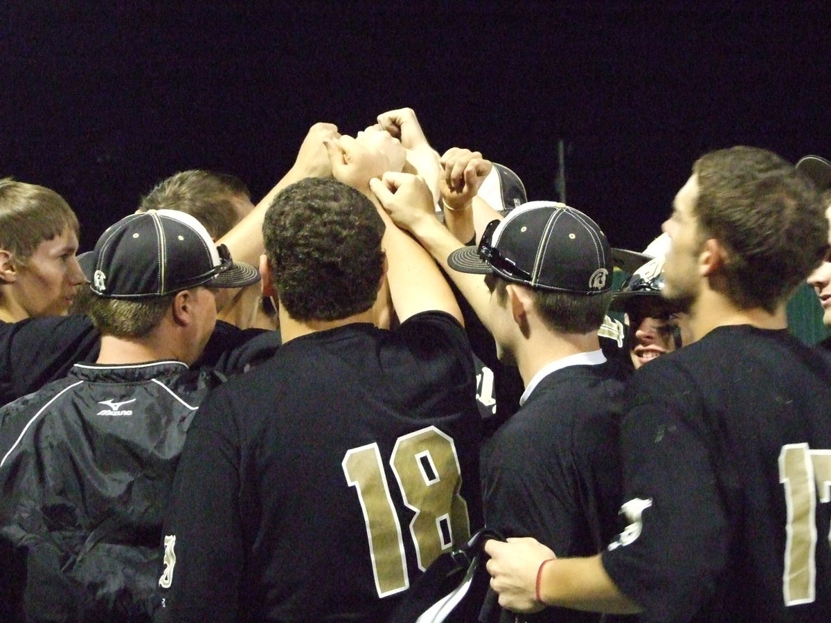 Image: The last huddle of the season for the varsity Gladiator baseball team.