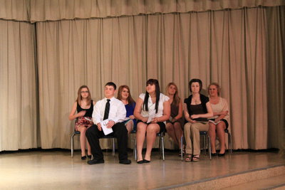 Image: The new NHS inductees wait for their names to be called.