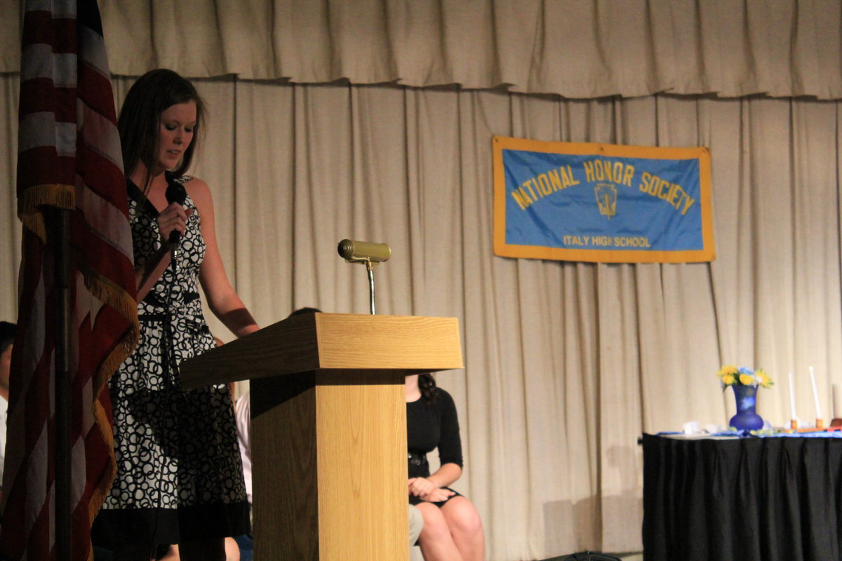 Image: Kaitlyn Rossa reads the NHS guidelines regarding “Scholarship.”