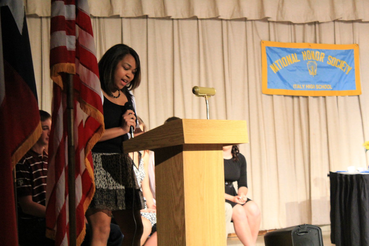 Image: Destani Anderson (senior) reading “Citizenship” guidelines as set by the NHS.