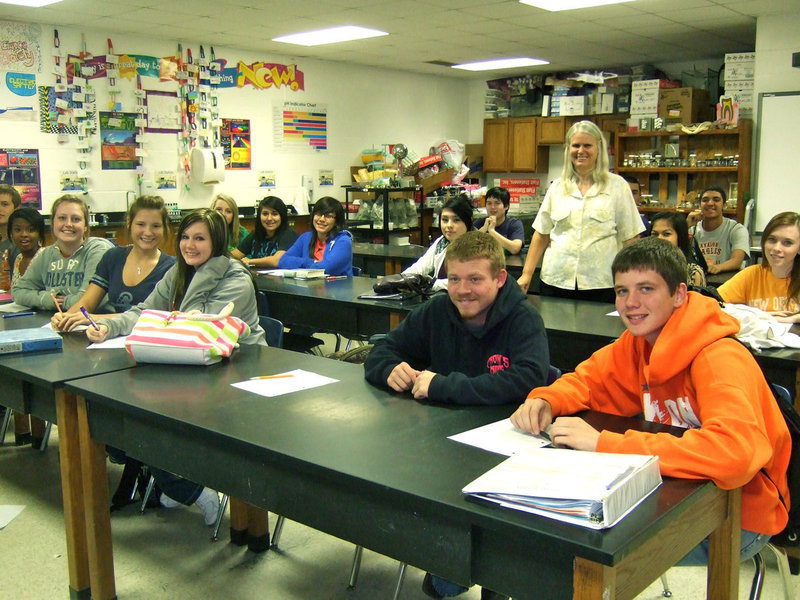 Image: Denise Campbell teaches 7th through 12th grade science. Here she is with her sophomore class.