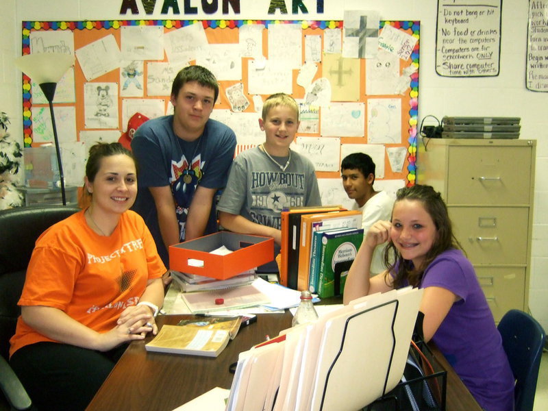 Image: Brettne Cole teaches 7th grade reading. She is pictured here with some of her students.