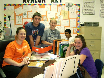 Image: Brettne Cole teaches 7th grade reading. She is pictured here with some of her students.