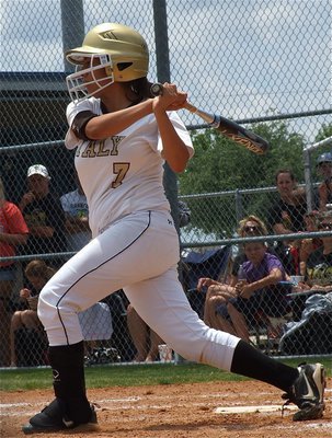 Image: Senior, Alma Suaste(7) battles at the plate, eventually earning a walk during Italy’s final at bat.