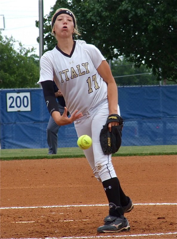 Image: Lady Gladiator pitcher, Megan Richards(17), goes after the Lady Pirate lineup.