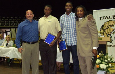 Image: Bryan Irwin and Keith Davis present the Keith Davis Award to Gladiators, Larry Mayberry, Jr. and Devonta Simmons.