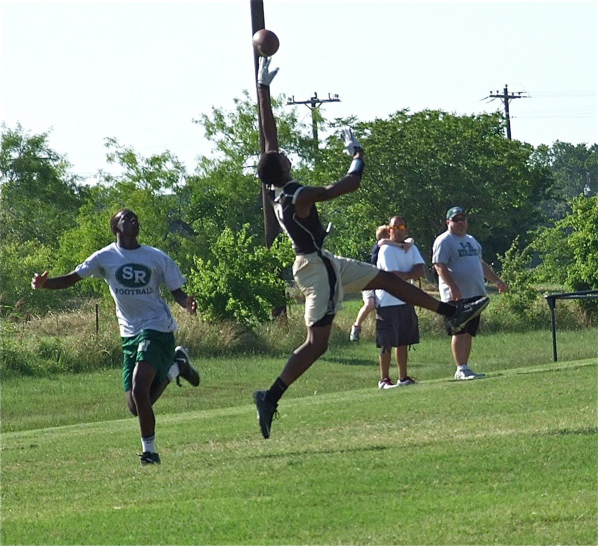 Image: Italy’s Trevon Robertson picks off another Wildcat pass attempt.