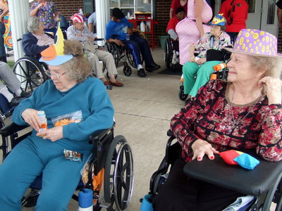 Image: These two residents are ready for the games to begin.