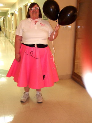 Image: Back to the 50’s Carolyn Powell (activities director) is dressed for the occasion.