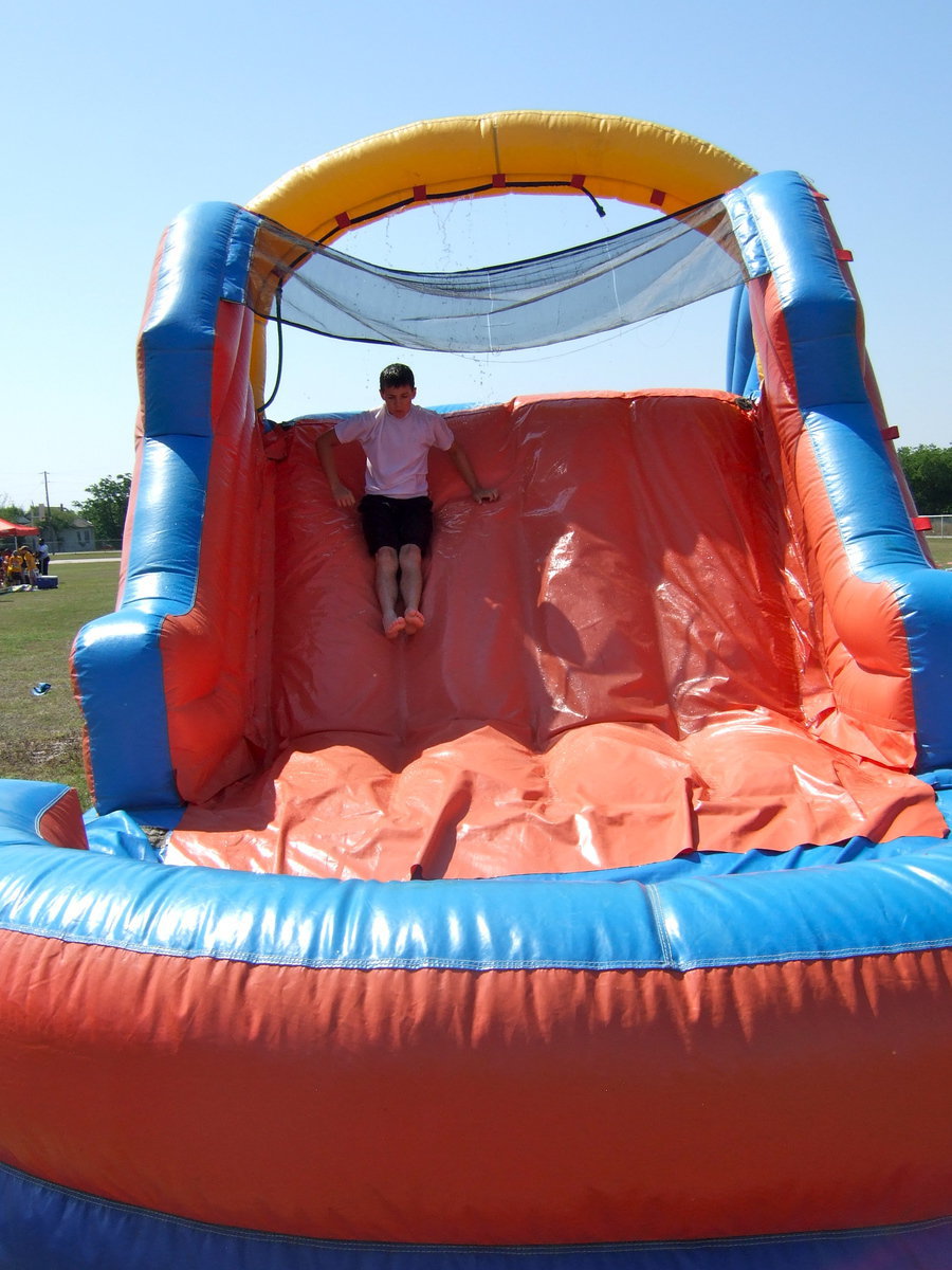 Image: Down the slide he goes.