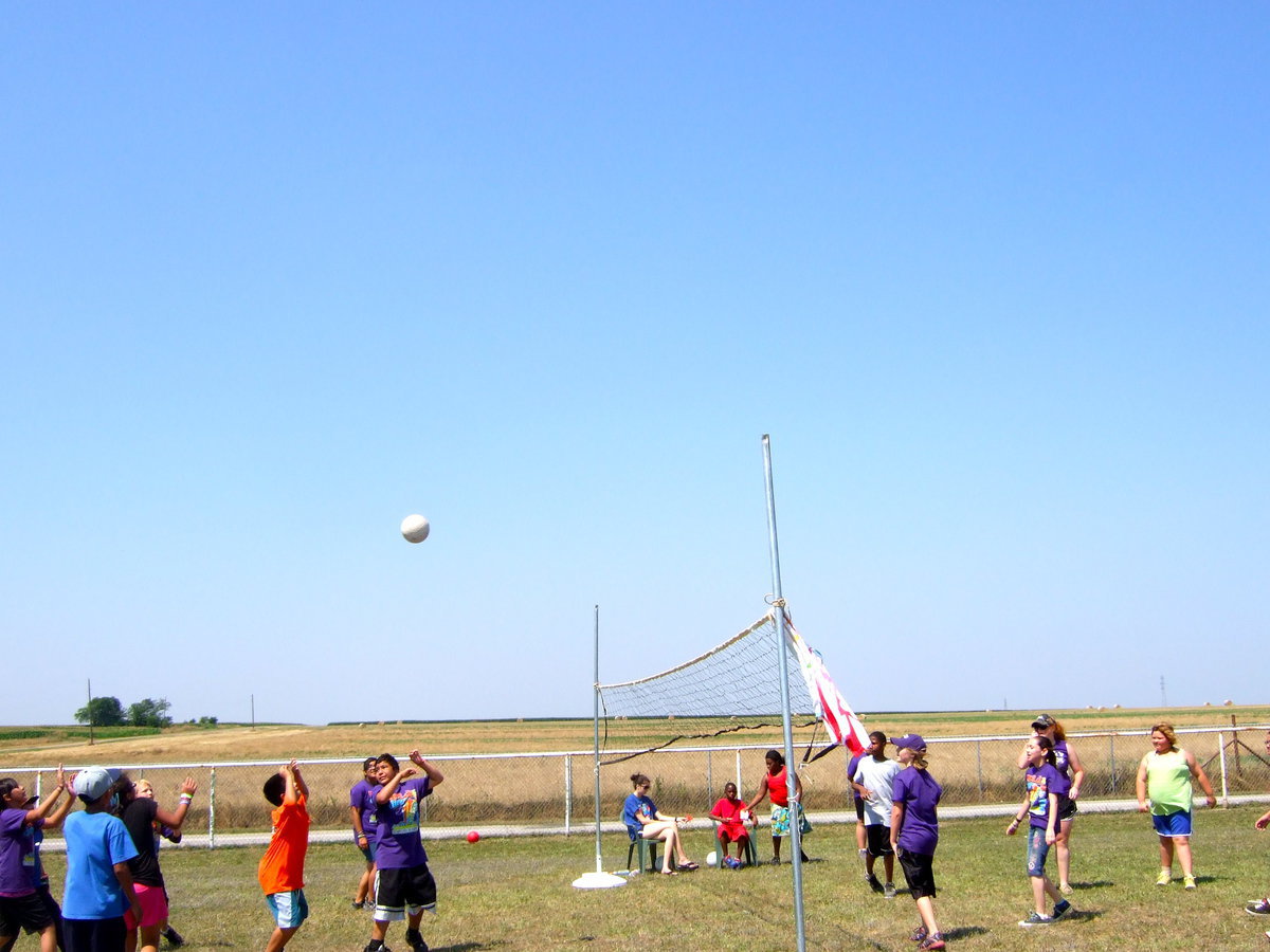 Image: Playing volleyball.