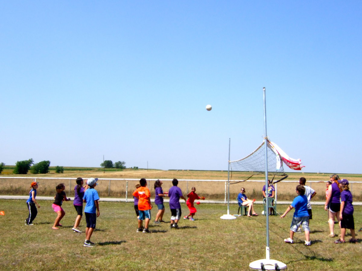 Image: They returned the ball and everyone is ready to hit it back over the net.