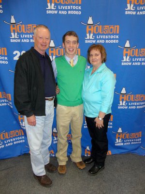 Image: Dan with his parents, Dale and Julie Crownover