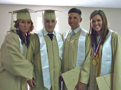 Image: Bailey Bumpus, Ethan Saxon, Kyle Jackson and Kaitlyn Rossa take a minute for a photo before the services.