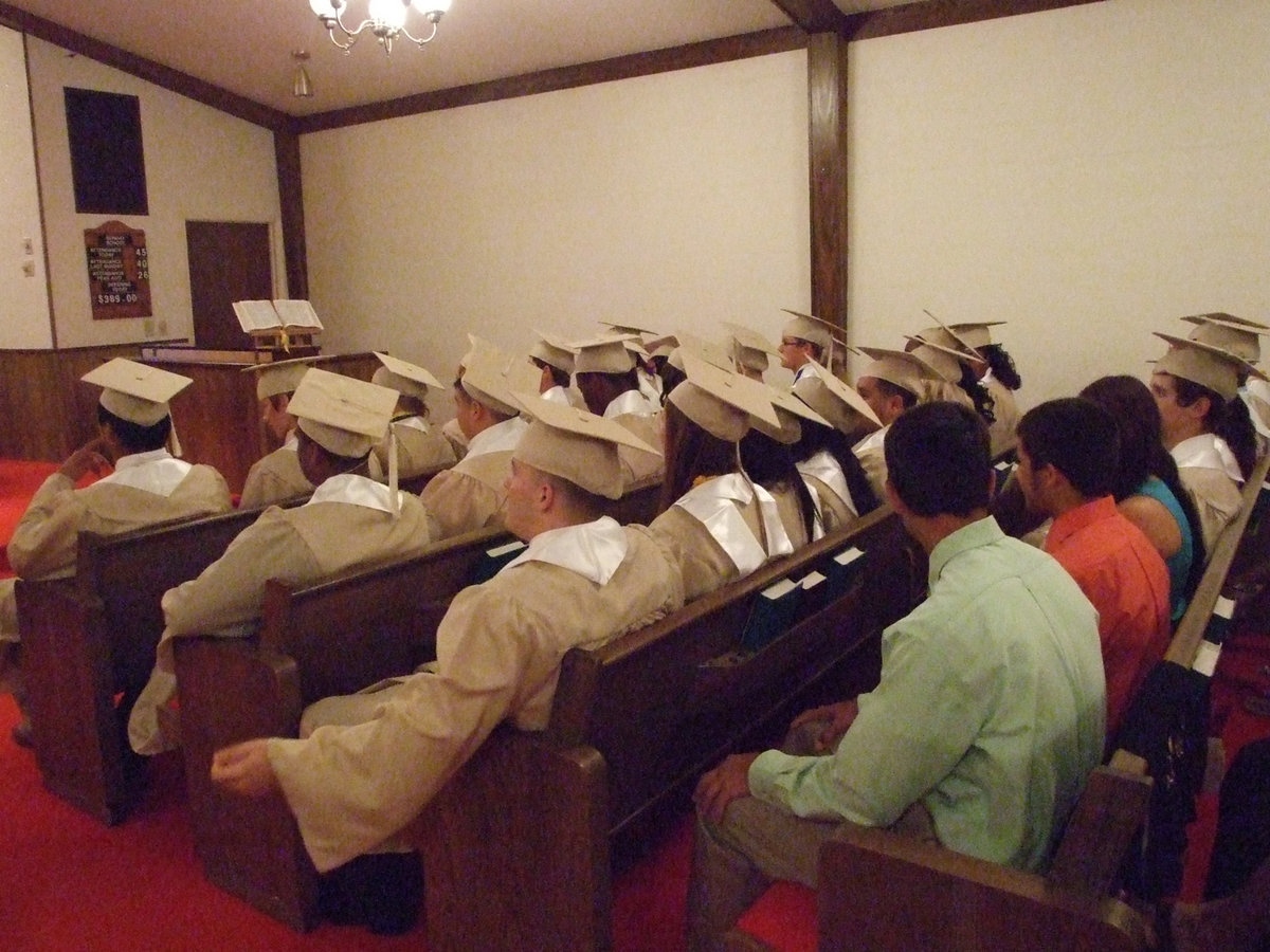 Image: The Class of 2012 listen intently to the speakers at the Baccalaureate service.