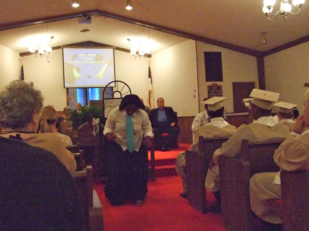 Image: Italy Ministerial Alliance hosted the Baccalaureate and is the umbrella in which the local churches serve.  The group performing is dancing a “Praise Dance” and they are from Mt. Gilead Missionary Baptist Church.