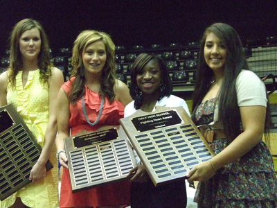 Image: Katilyn Rossa, Bailey Bumpus, Jameka Copeland and Alyssa Richards received awards from girl’s basketball coach, Randy Parks.