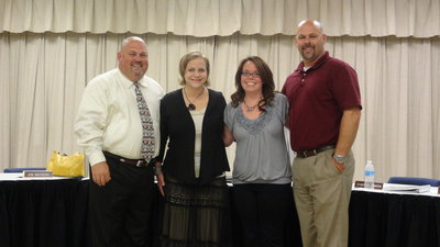 Image: Newly-hired teachers Wayne Rowe, Melinda Hines and Kim Watkins with Lee Joffre, IHS principal.