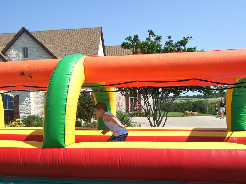 Image: A water slide canal boat is lots of fun.