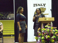 Image: Pat Price awarded her granddaughter, Destani Anderson, with the Stafford Alumni Scholarship.