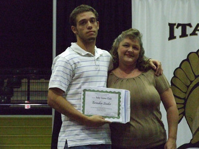Image: Flossie Gowin presented Brandon Souder the Italy Lions Club Scholarship.