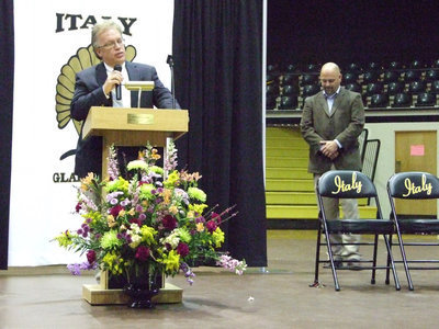 Image: Superintendent Barry Bassett addresses the graduates and their families while principal Lee Joffre looks on.